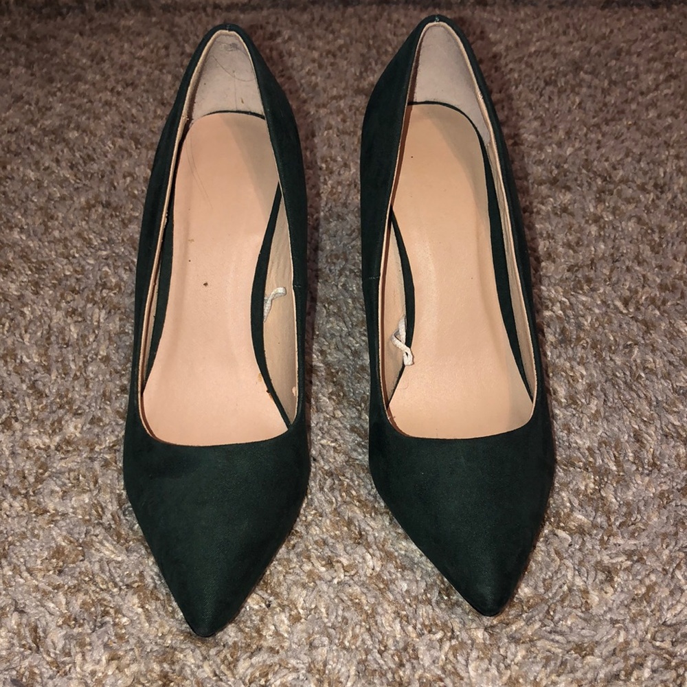 Green really high heels.